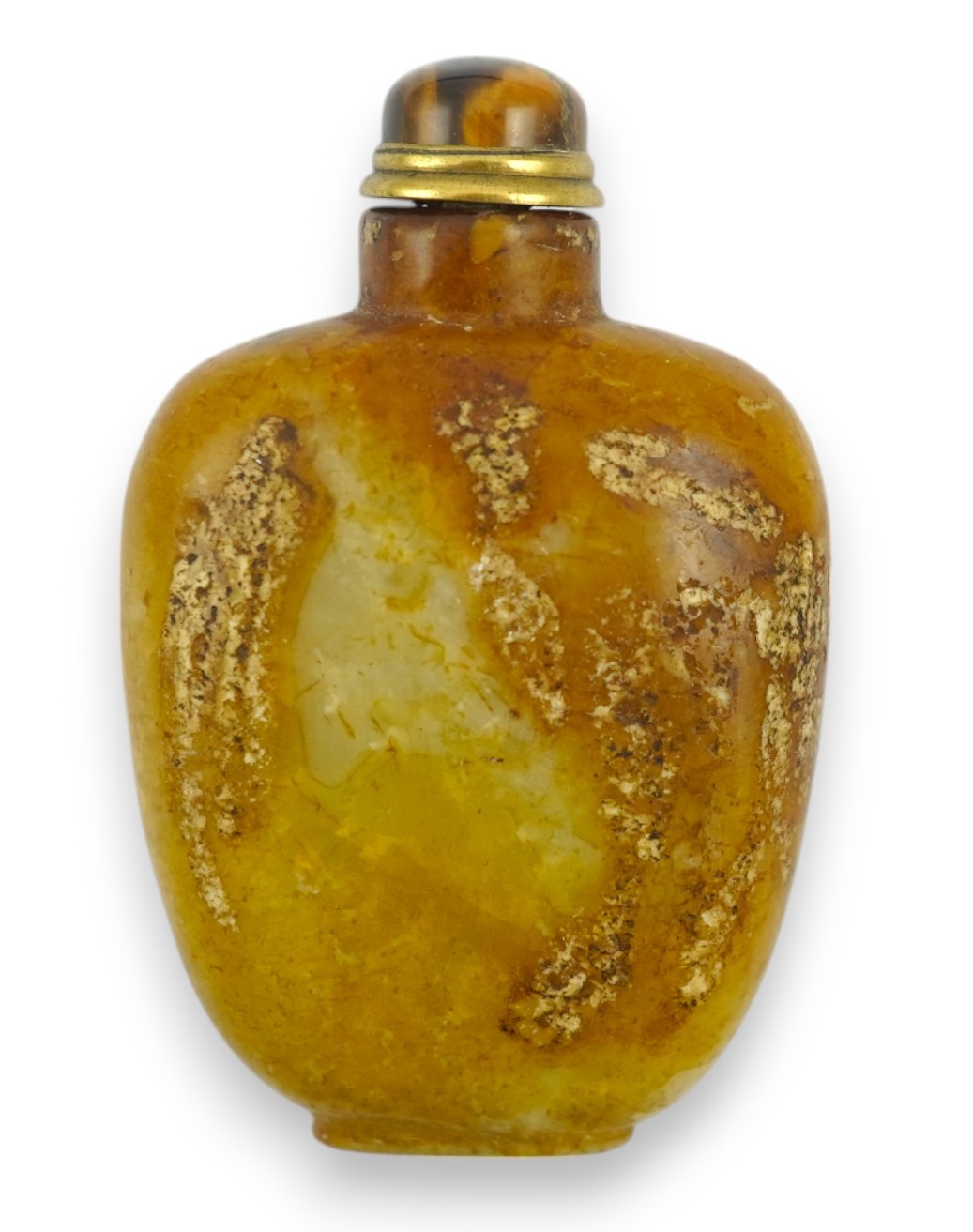 A Chinese soapstone snuff bottle with tiger's eye stopper, 8cm high. Condition - fair